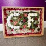 Panel floral con letras en foan y preservado